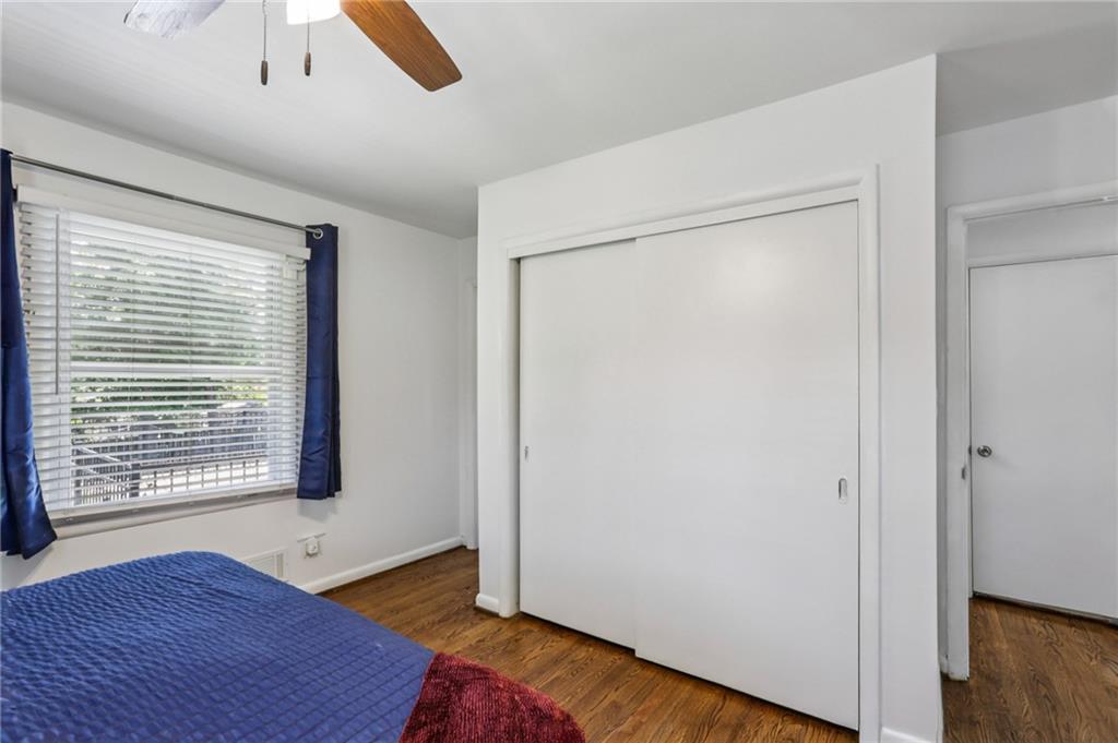 2740 Frontier Trail Atlanta, GA 30341 - Photo 24 of 29 a view of an empty room with wooden floor and a window
