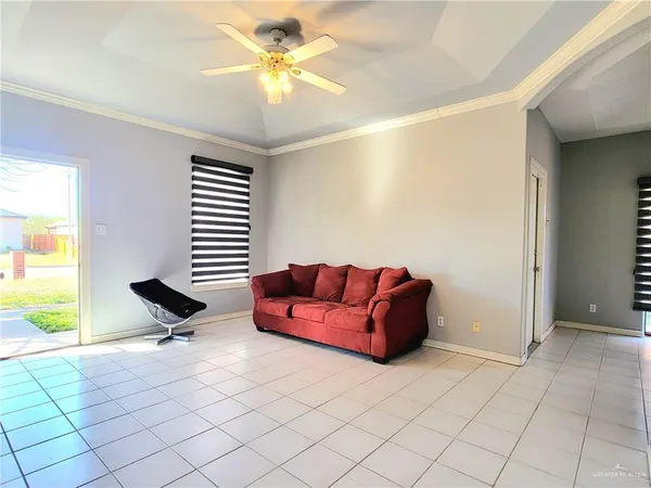 a living room with furniture and a table