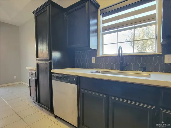 a bathroom with a tub and a sink