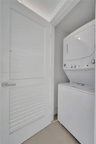 a bathroom with a bathtub and a sink