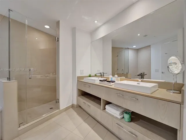 a view of a patio with couches and potted plants