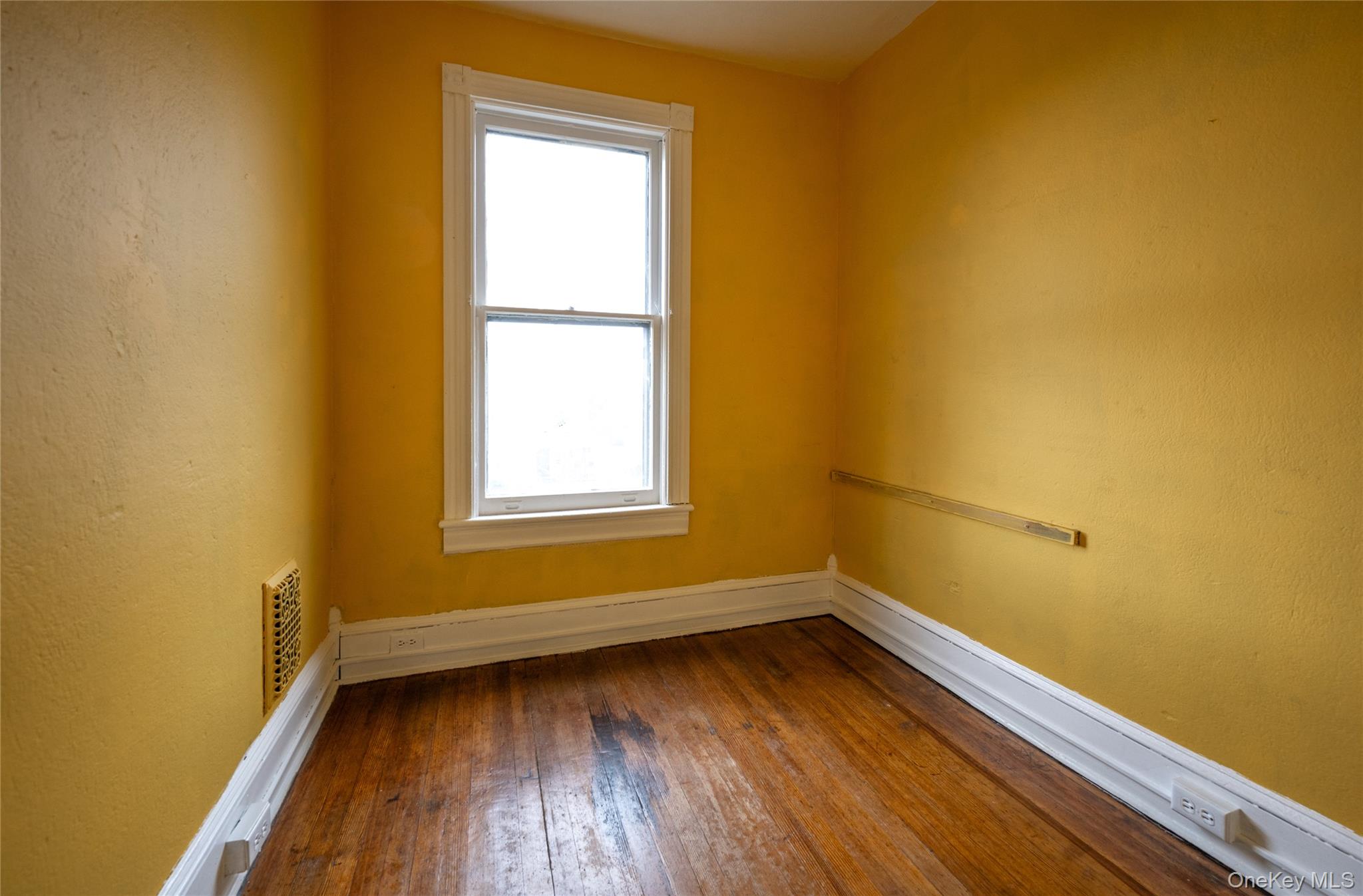 39 Hamilton Avenue Ossining, NY 10562 - Photo 11 of 22 a view of a room with wooden floor and a window