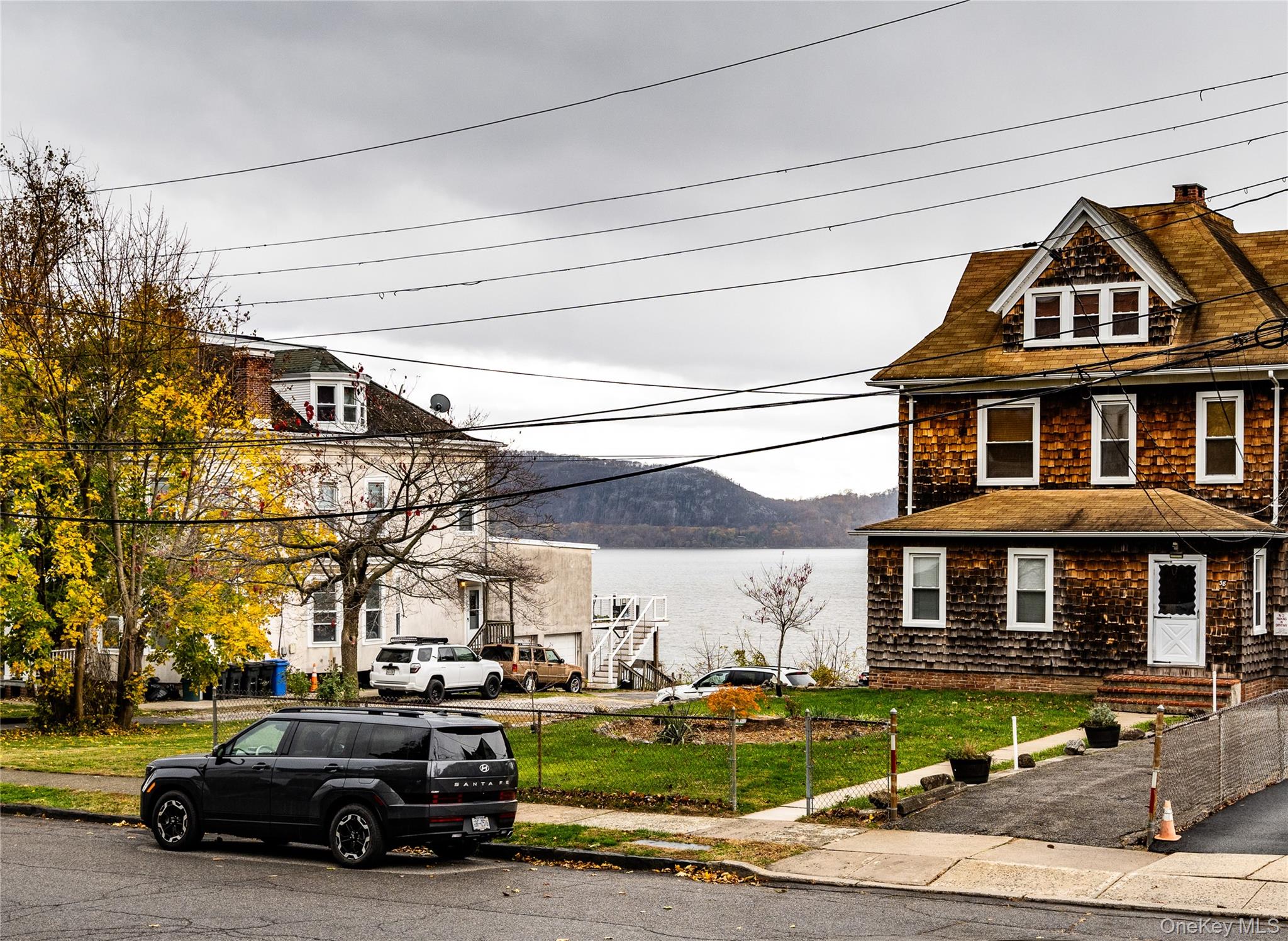 39 Hamilton Avenue Ossining, NY 10562 - Photo 3 of 22 a car parked in front of a building