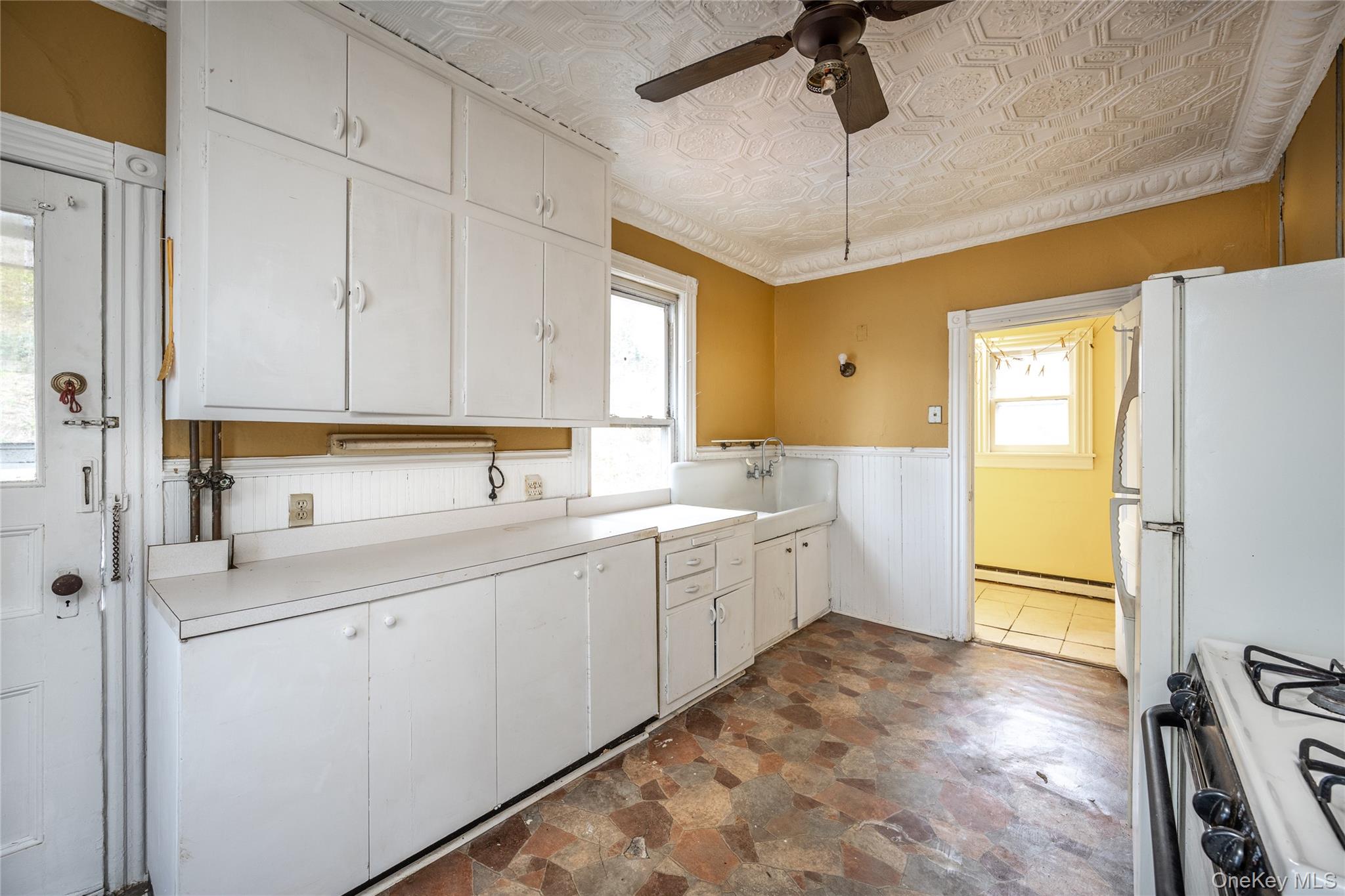 39 Hamilton Avenue Ossining, NY 10562 - Photo 8 of 22 a kitchen with sink cabinets and window