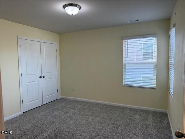 212 Brook Farm Lane Fuquay-Varina, NC 27526 - Photo 12 of 23 a view of an empty room with a window