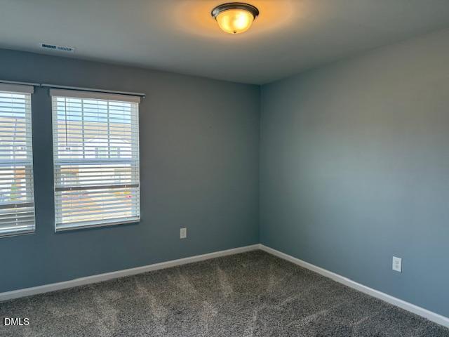 212 Brook Farm Lane Fuquay-Varina, NC 27526 - Photo 10 of 23 an empty room with window