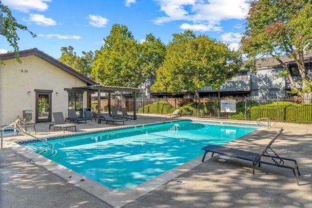 a view of a building with a street
