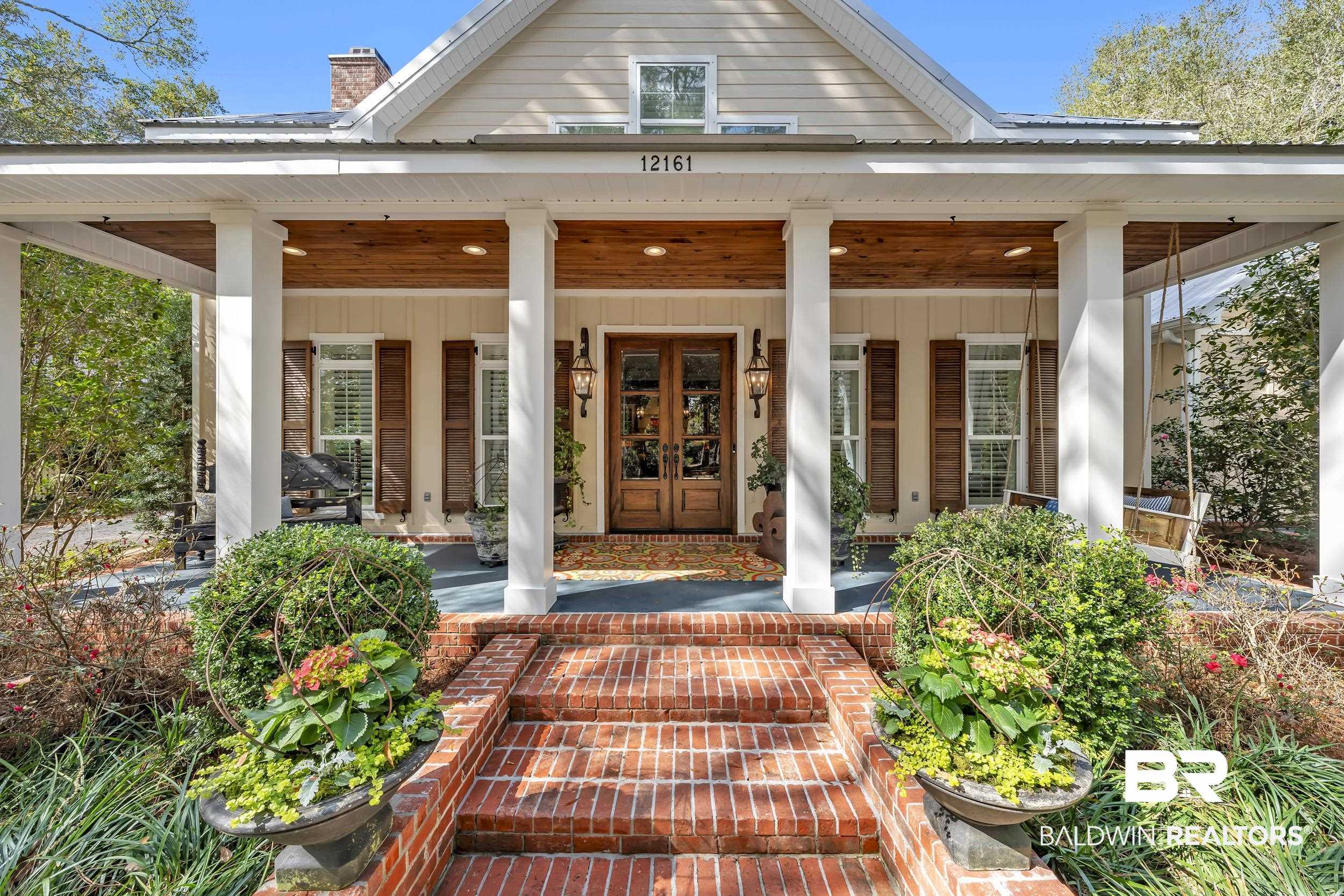 12161 Jessamine Street Magnolia Springs, AL 36555 - Photo 57 of 70 Property entrance with a porch and a chimney
