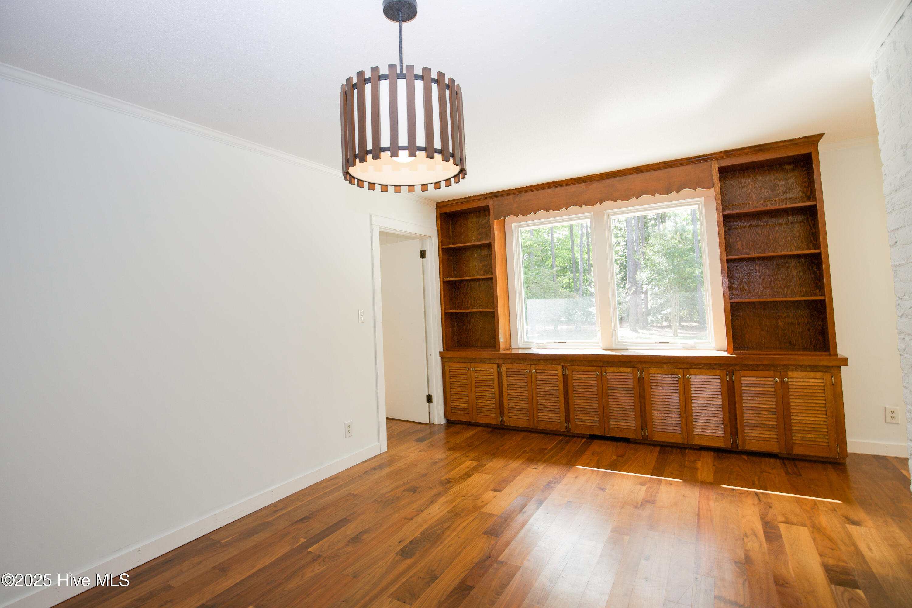 100 Beaver Lane Pinehurst, NC 28374 - Photo 11 of 51 Built ins, and view to back yard
