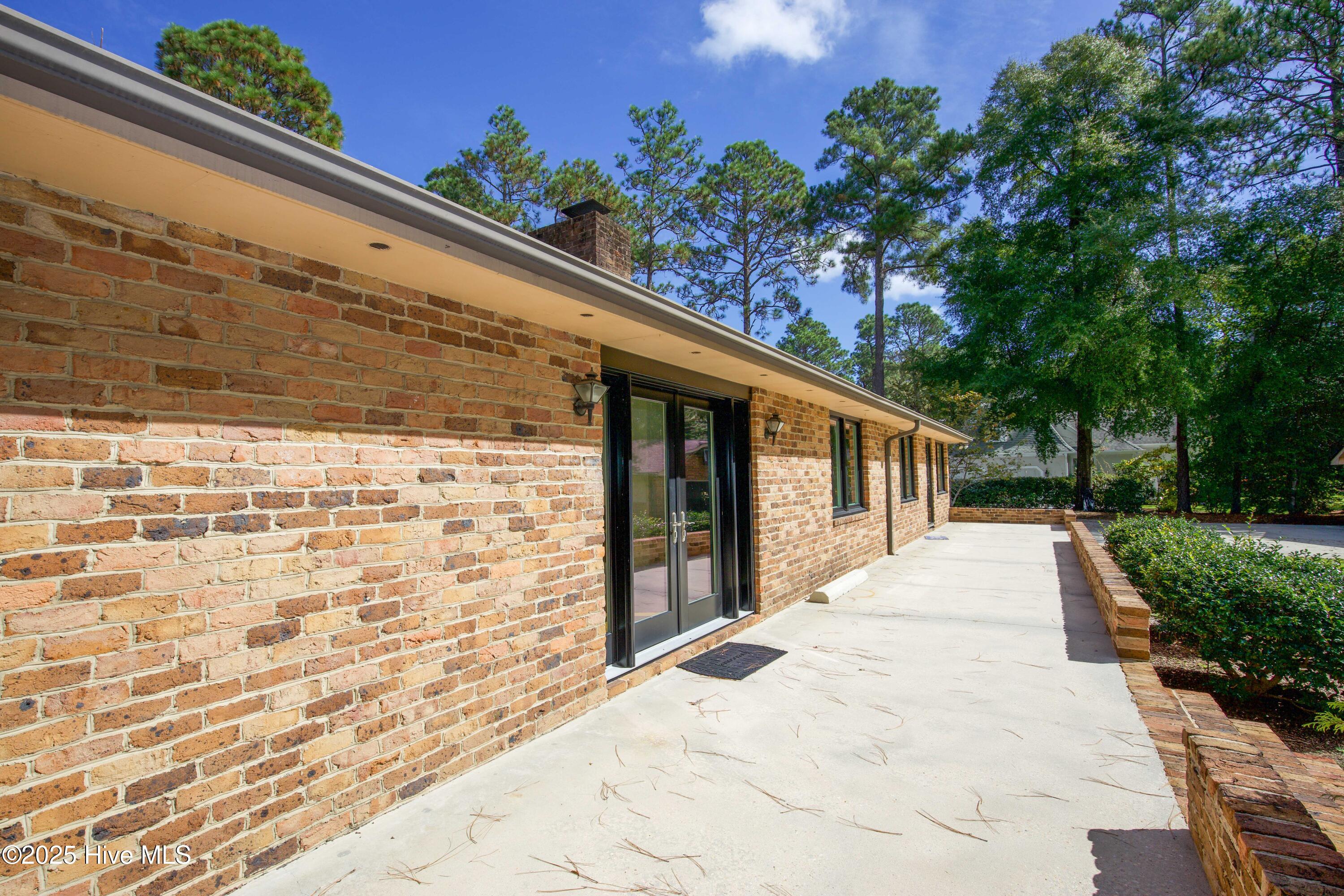 100 Beaver Lane Pinehurst, NC 28374 - Photo 39 of 51 Patio all across the back