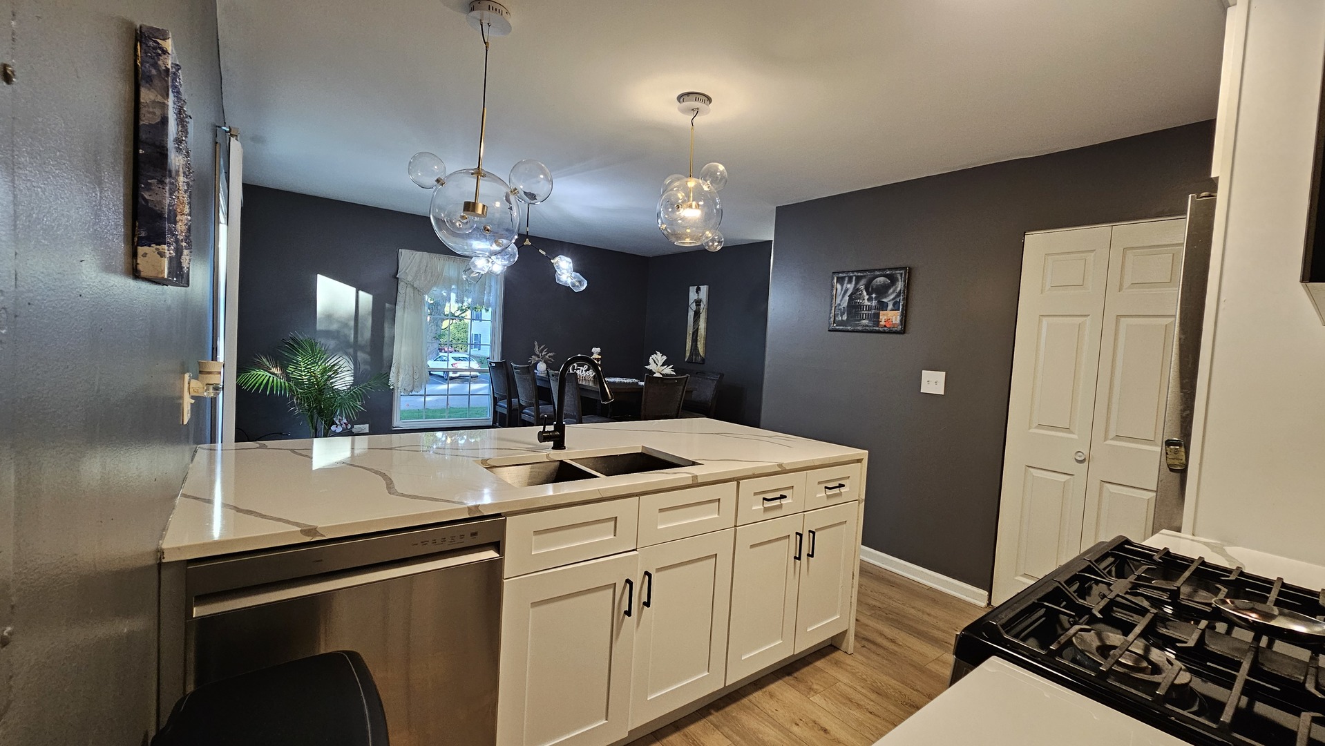 16 Forest Lane Cary, IL 60013 - Photo 11 of 50 a kitchen with a sink and refrigerator