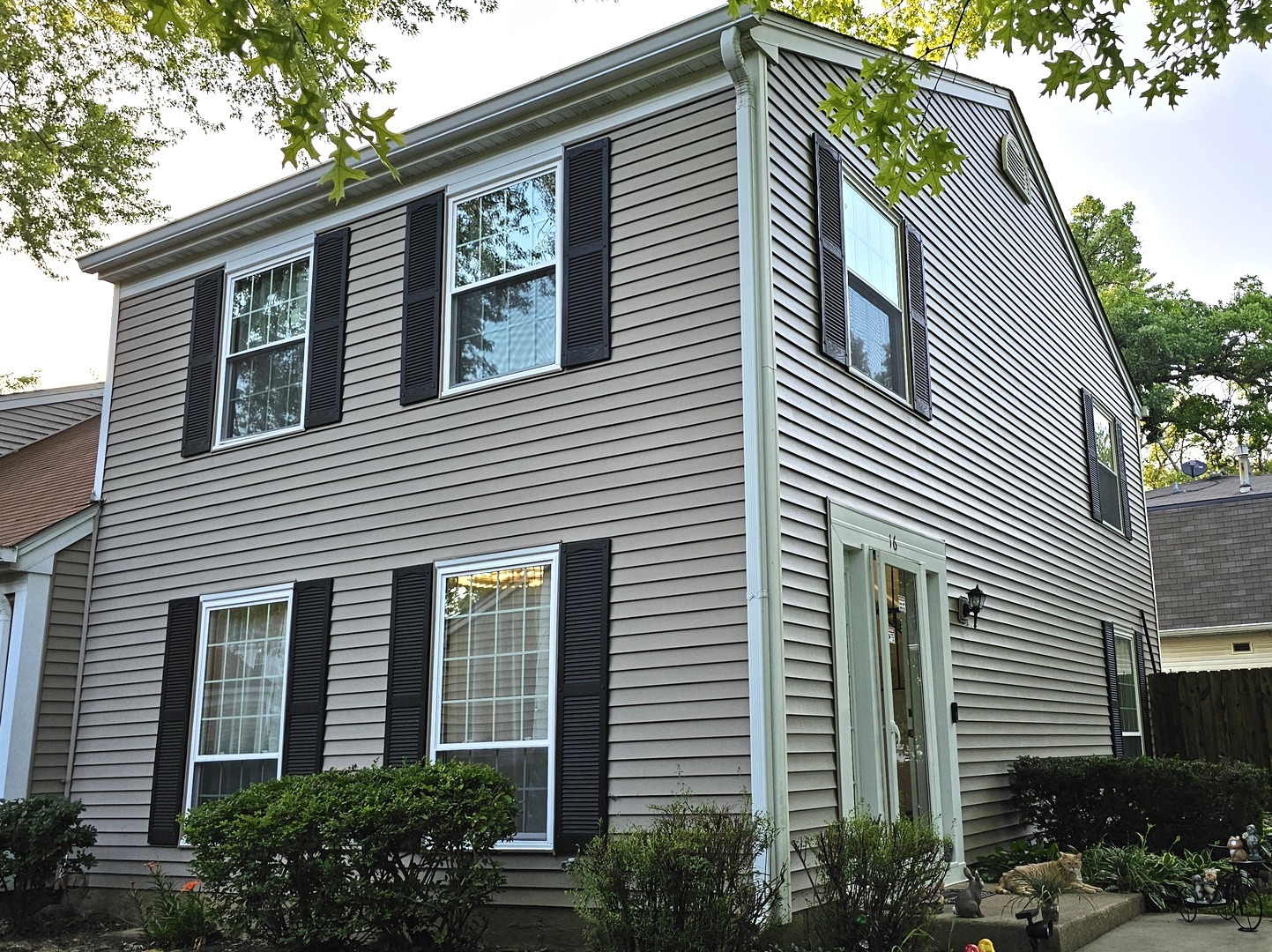 16 Forest Lane Cary, IL 60013 - Photo 2 of 50 a view of a house with a yard and potted plants