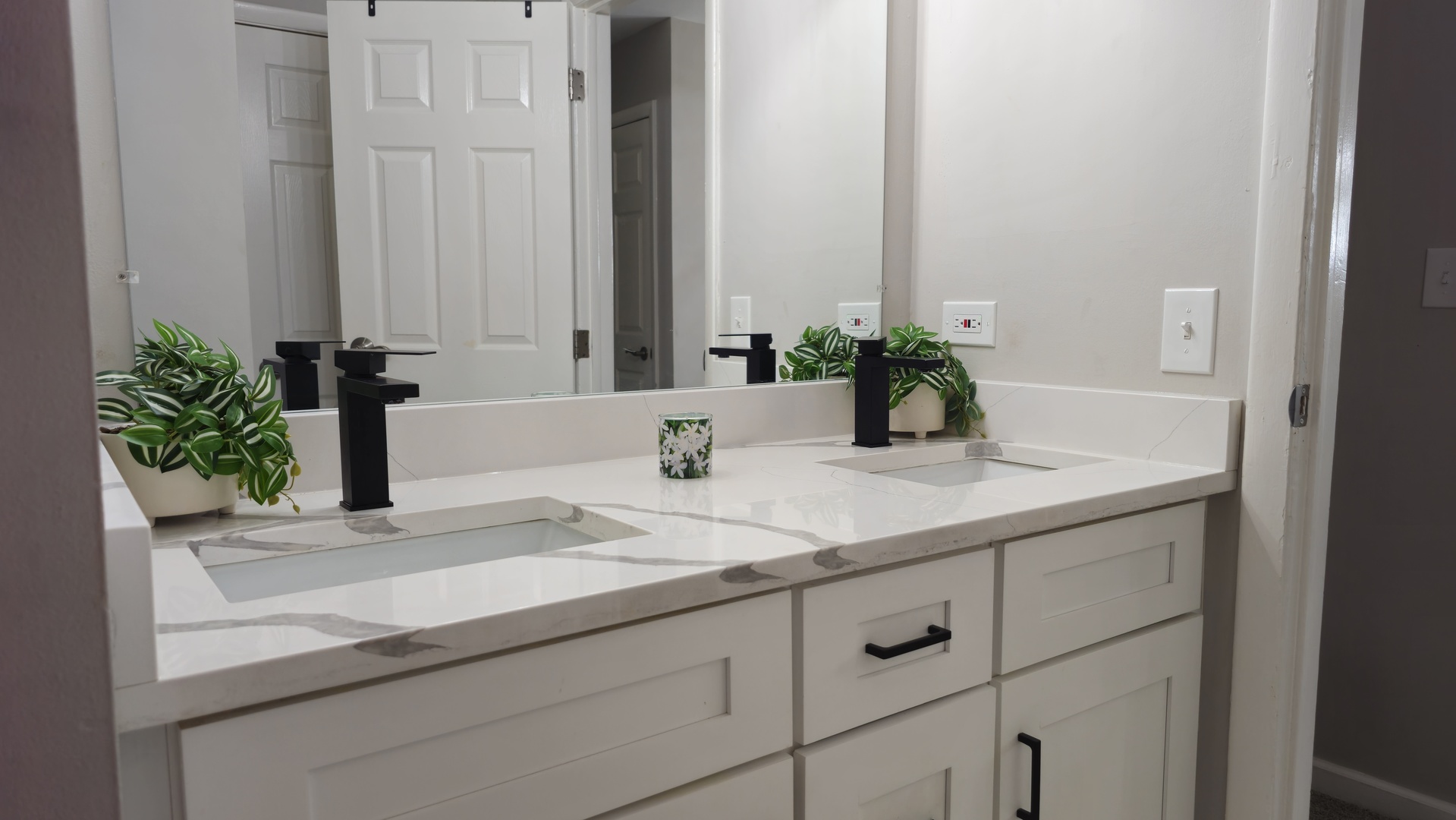 16 Forest Lane Cary, IL 60013 - Photo 37 of 50 a bathroom with a sink and a mirror