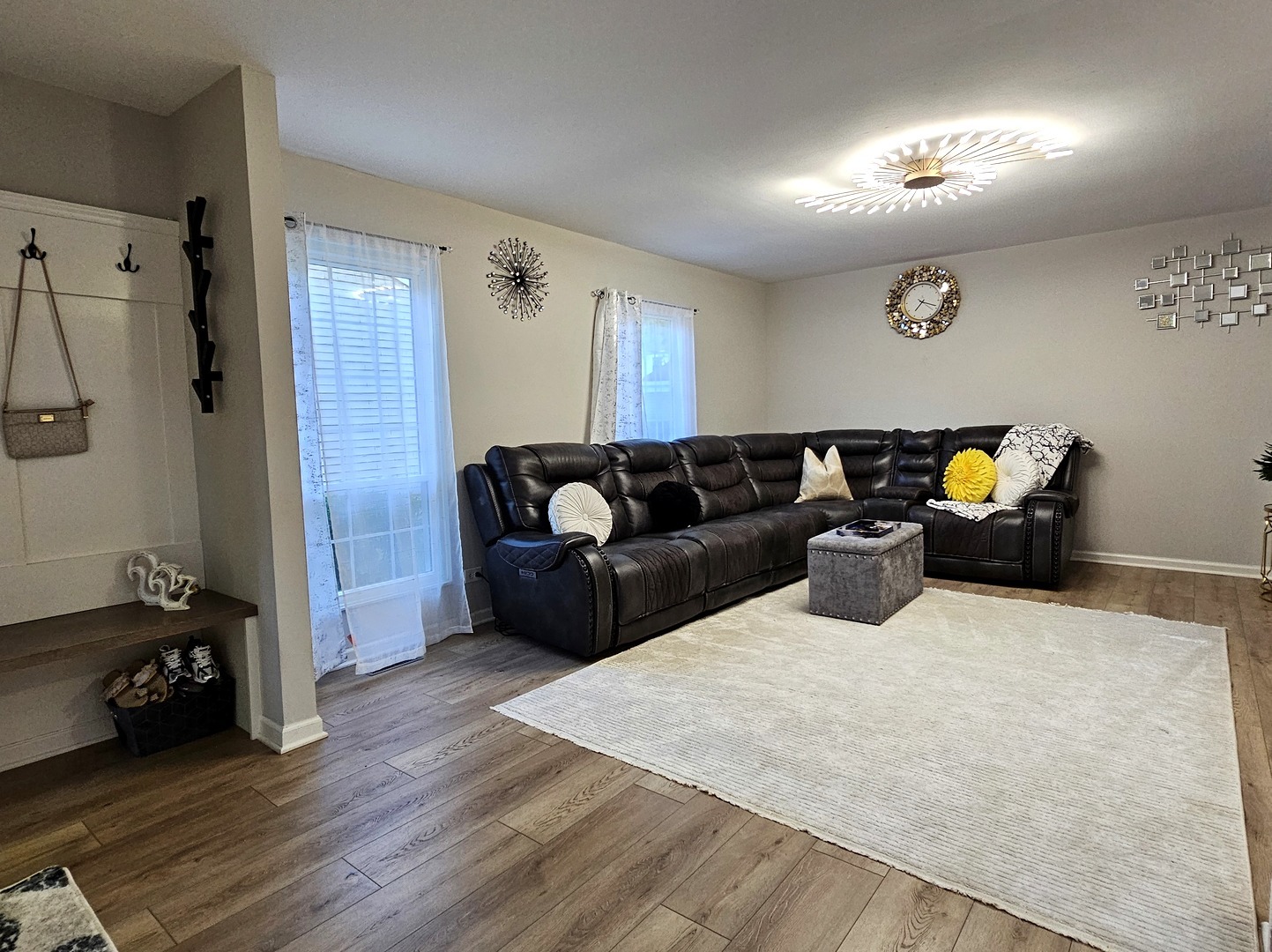 16 Forest Lane Cary, IL 60013 - Photo 7 of 50 a living room with furniture and a wooden floor