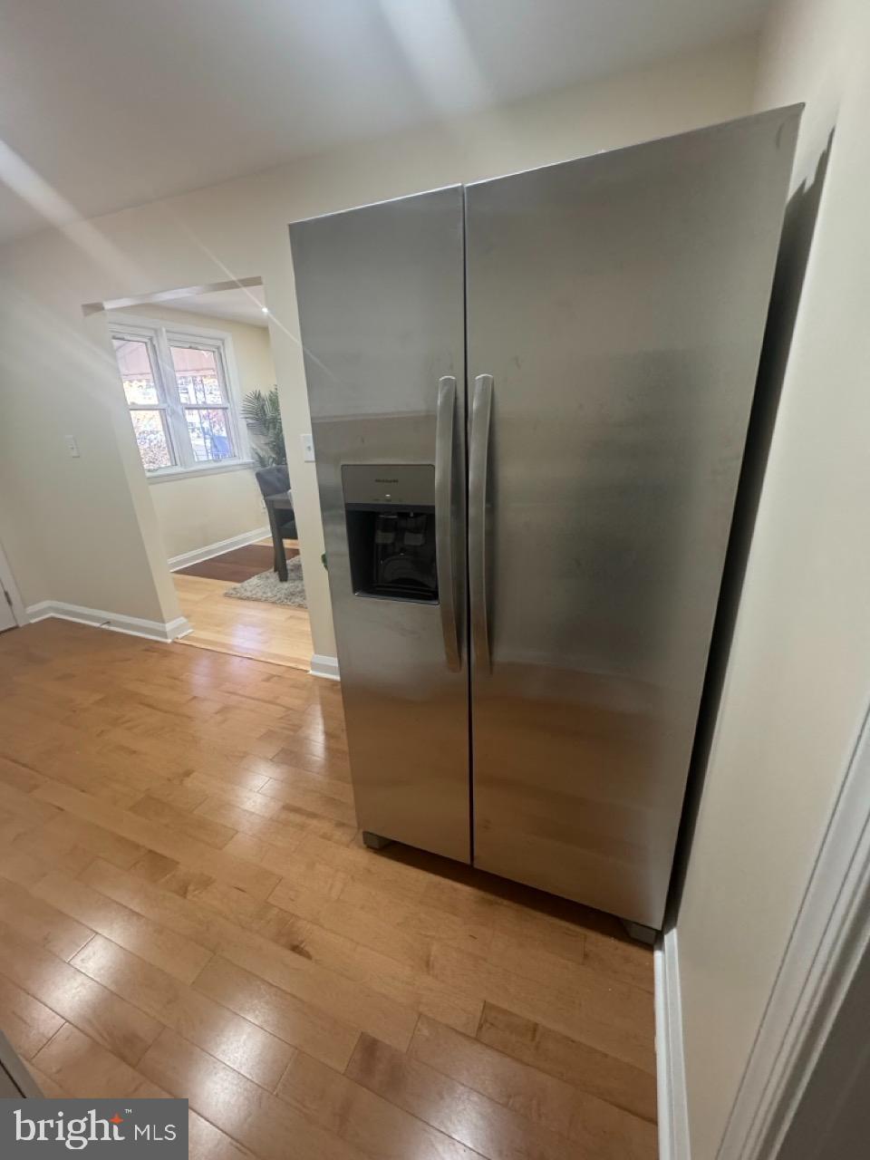 1231 Kevin Road Baltimore, MD 21229 - Photo 11 of 28 Sleek stainless steel refrigerator in bright sp...
