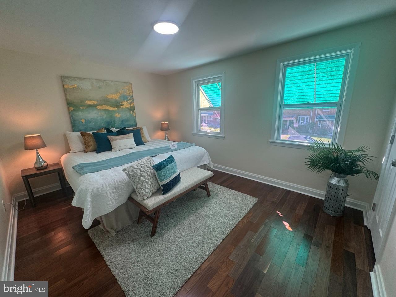 1231 Kevin Road Baltimore, MD 21229 - Photo 13 of 28 Serene bedroom with natural light and style.