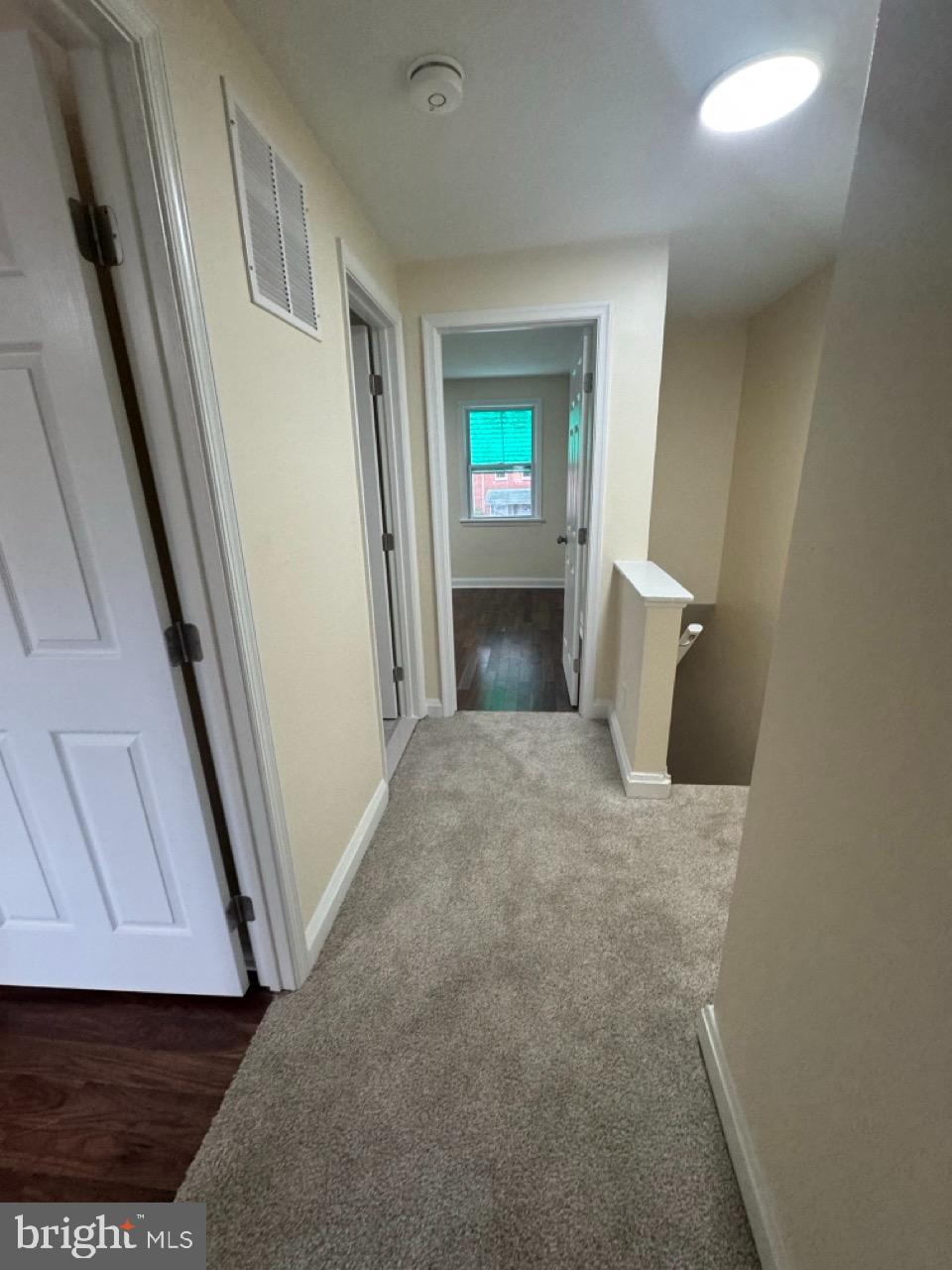 1231 Kevin Road Baltimore, MD 21229 - Photo 24 of 28 Bright and inviting hallway with soft carpet.