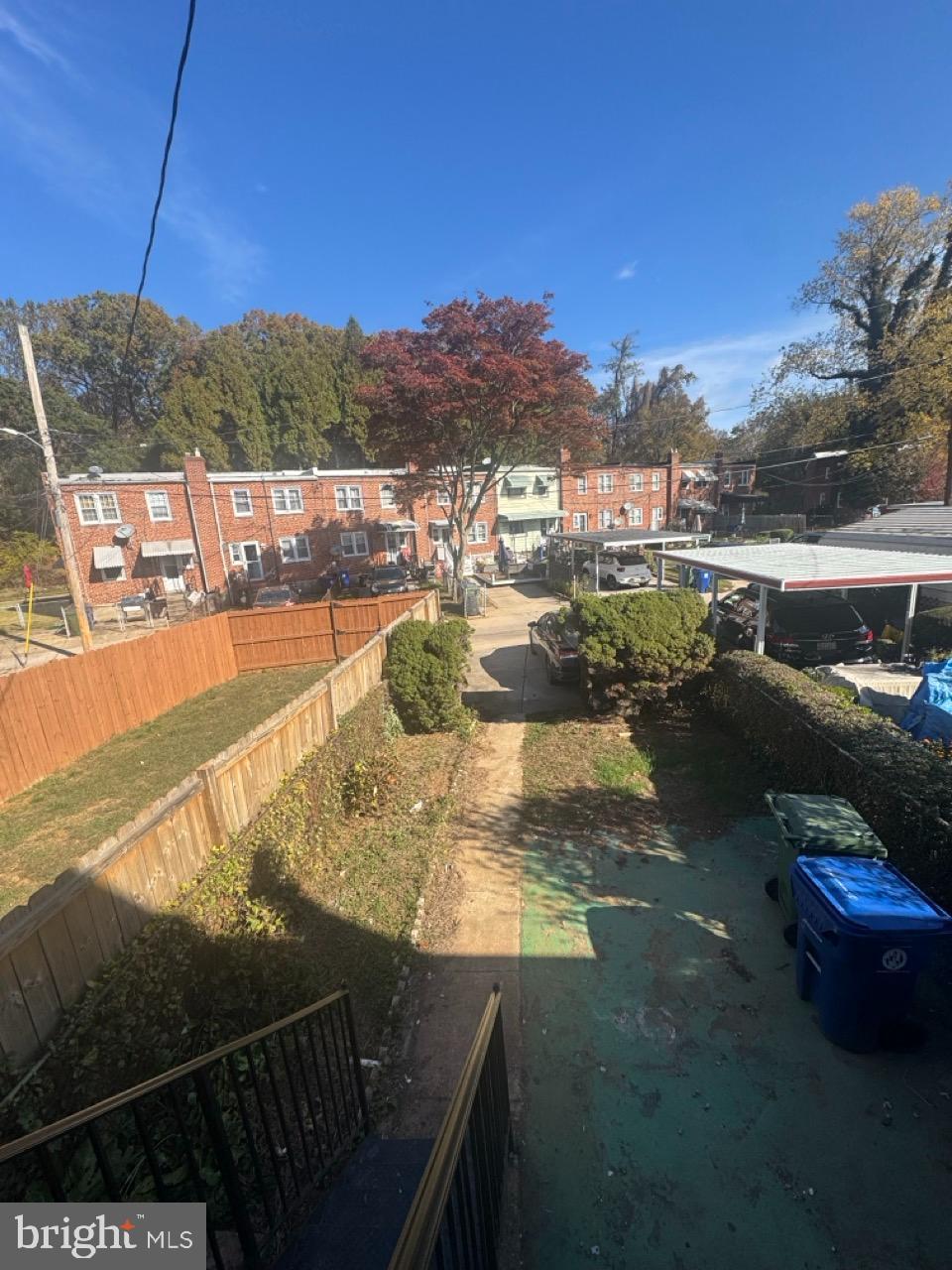 1231 Kevin Road Baltimore, MD 21229 - Photo 28 of 28 Charming backyard view with vibrant foliage.