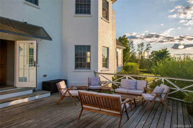 a view of a roof deck with couches
