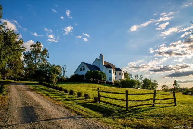a view of a bench in front of house