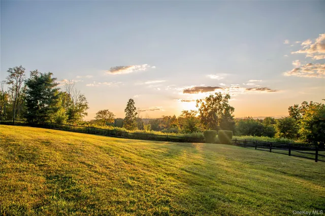 a view of an ocean and a mountain