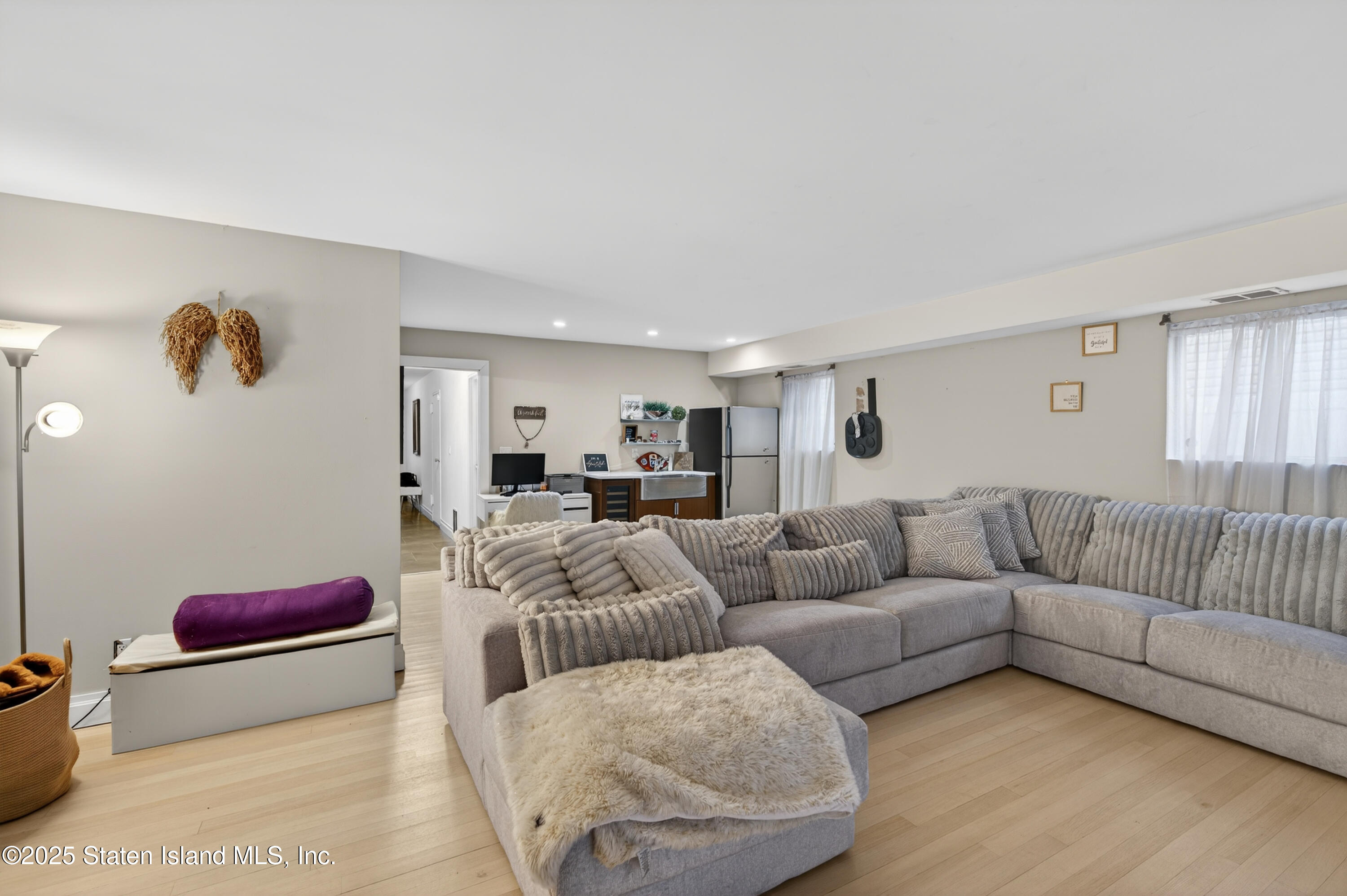 70 Annadale Road Staten Island, NY 10312 - Photo 11 of 35 a living room with furniture and a couch