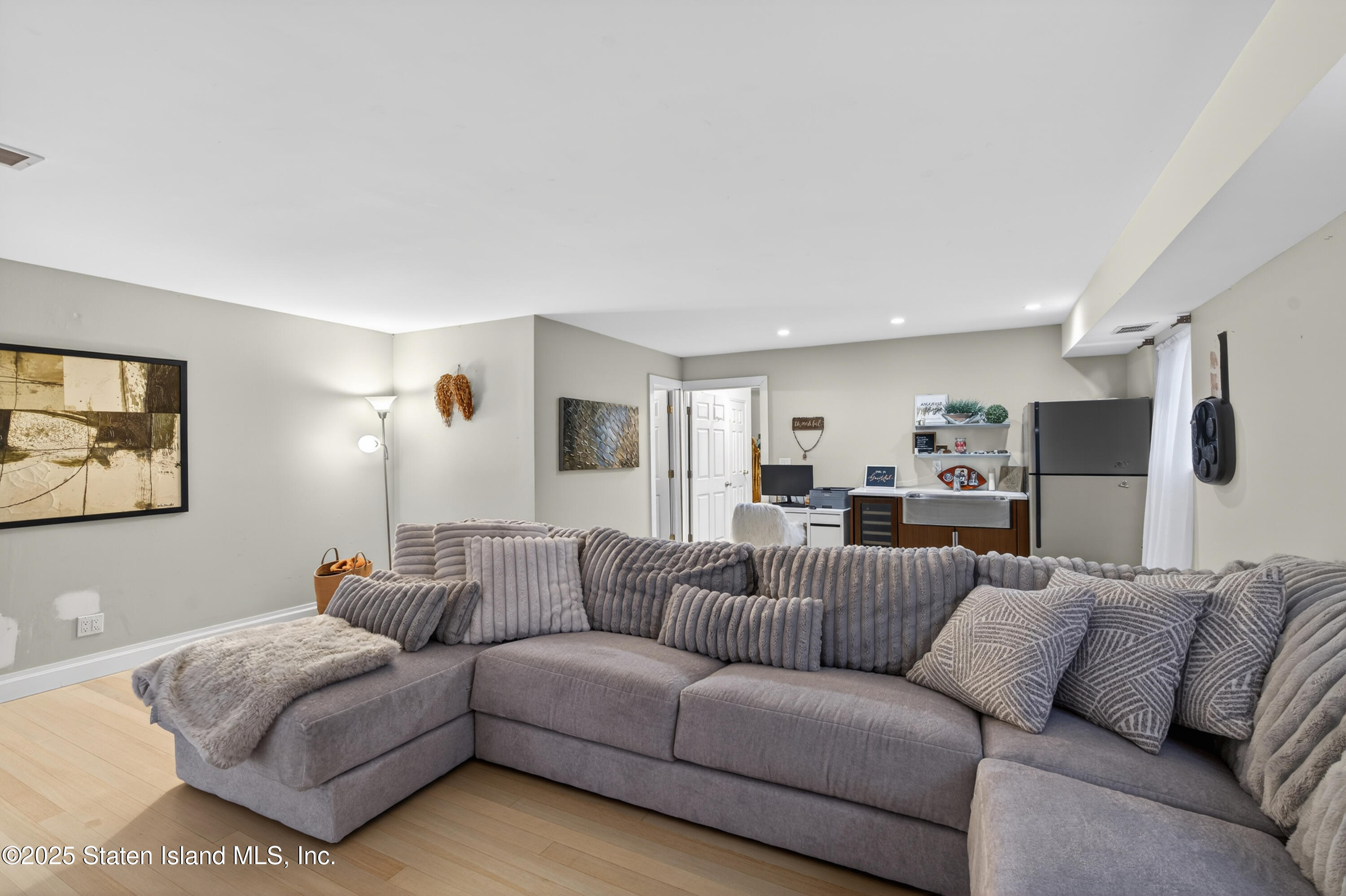 70 Annadale Road Staten Island, NY 10312 - Photo 12 of 35 a living room with furniture and a couch