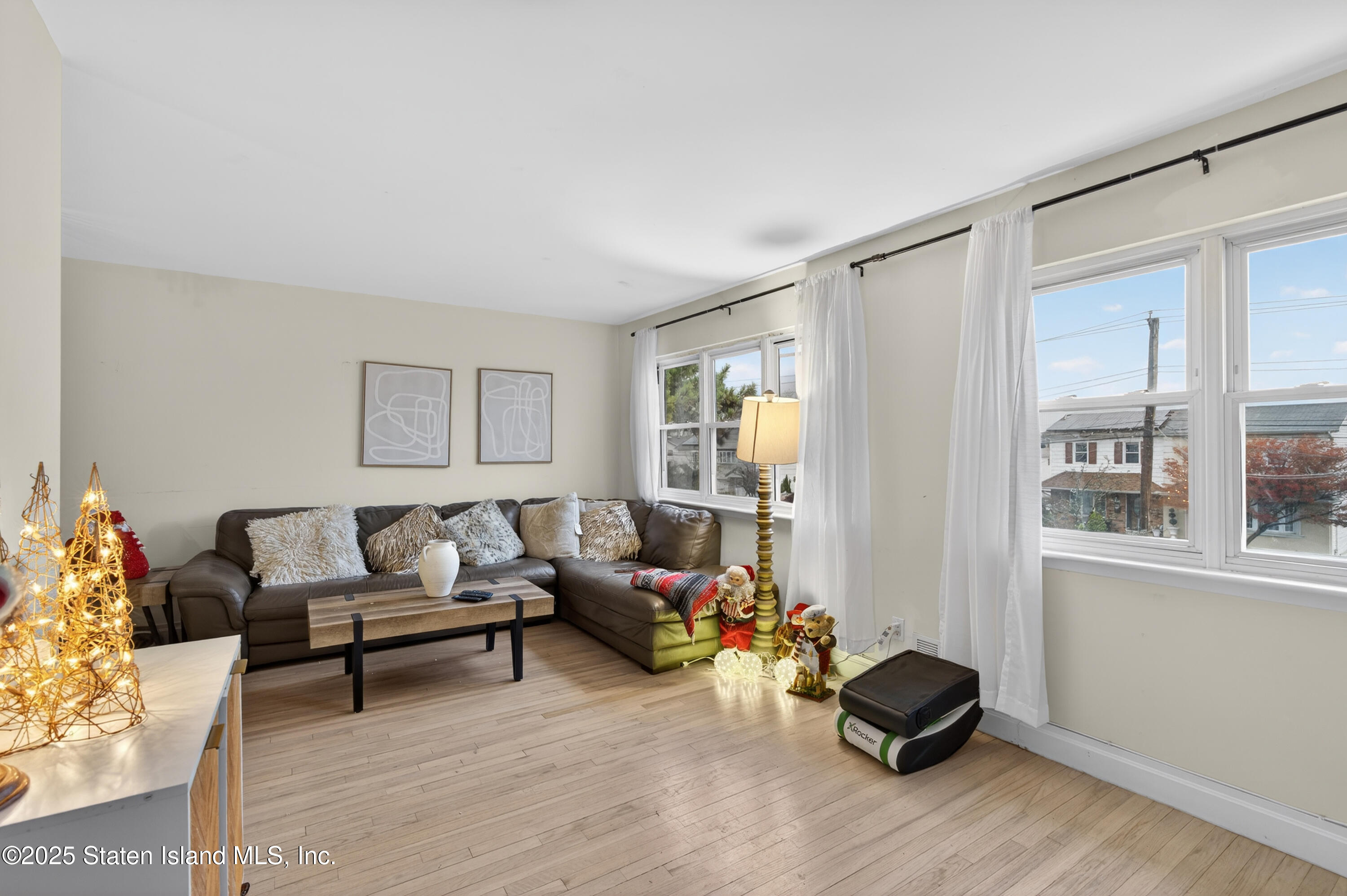 70 Annadale Road Staten Island, NY 10312 - Photo 23 of 35 a living room with furniture and a window