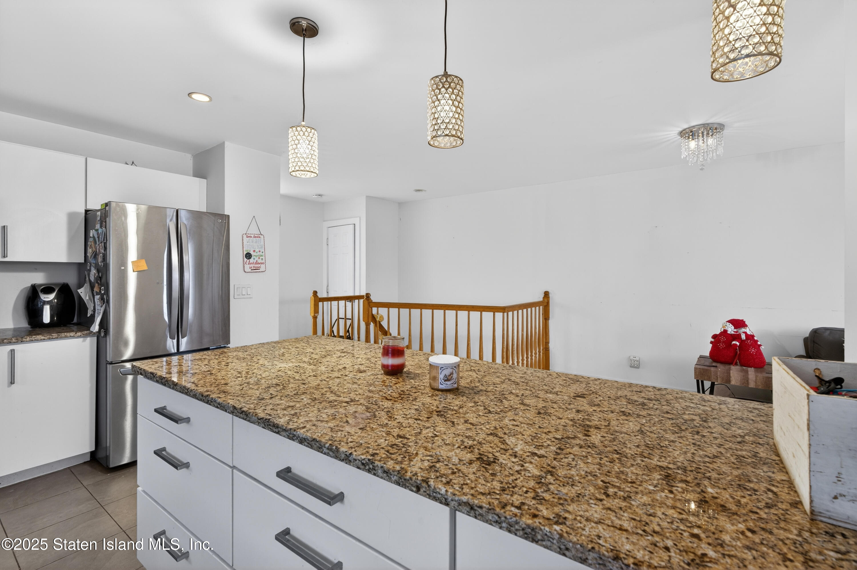 70 Annadale Road Staten Island, NY 10312 - Photo 25 of 35 a kitchen with granite countertop a refrigerator a stove and a sink