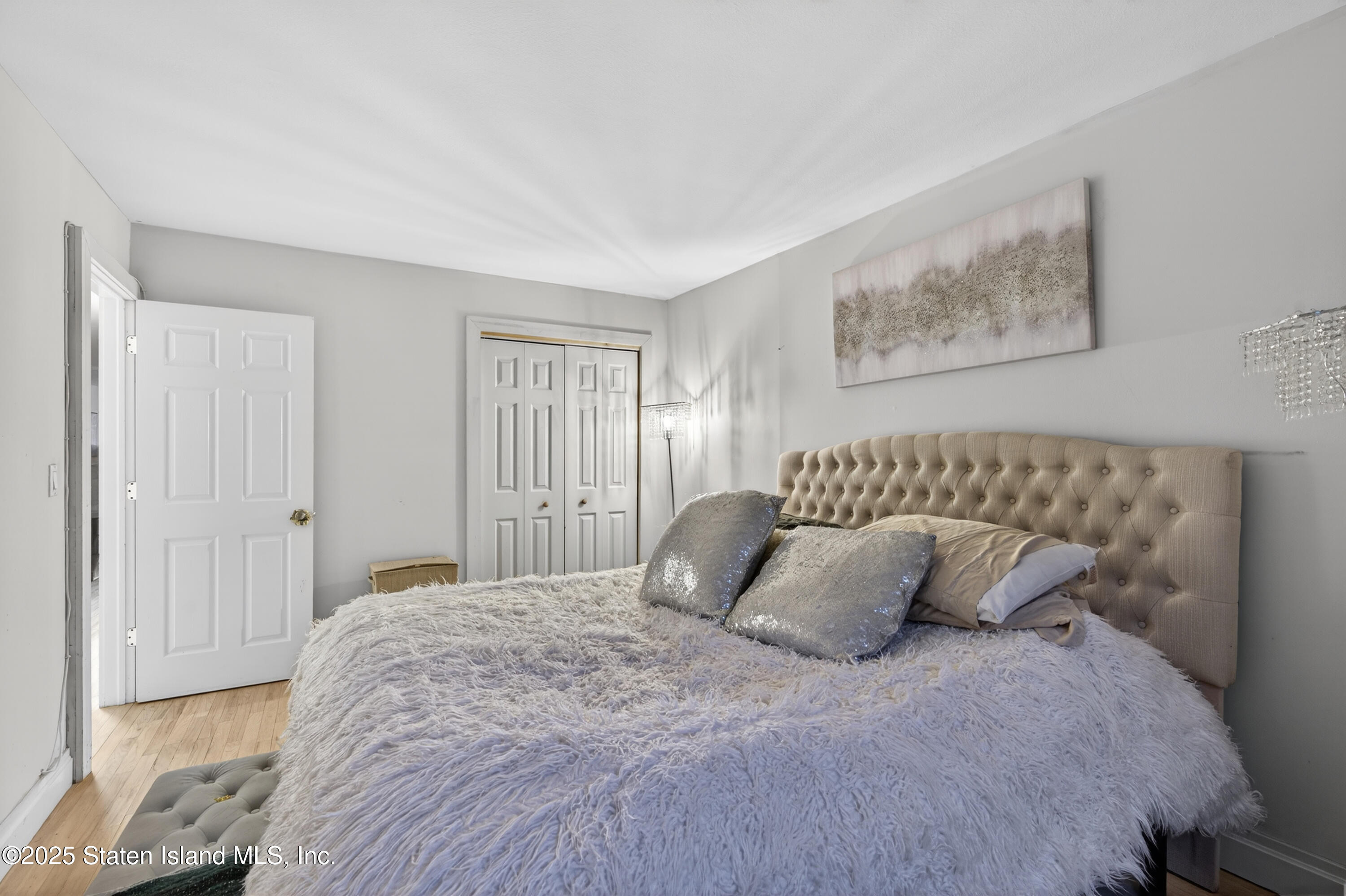 70 Annadale Road Staten Island, NY 10312 - Photo 30 of 35 a bedroom with a large bed and a window