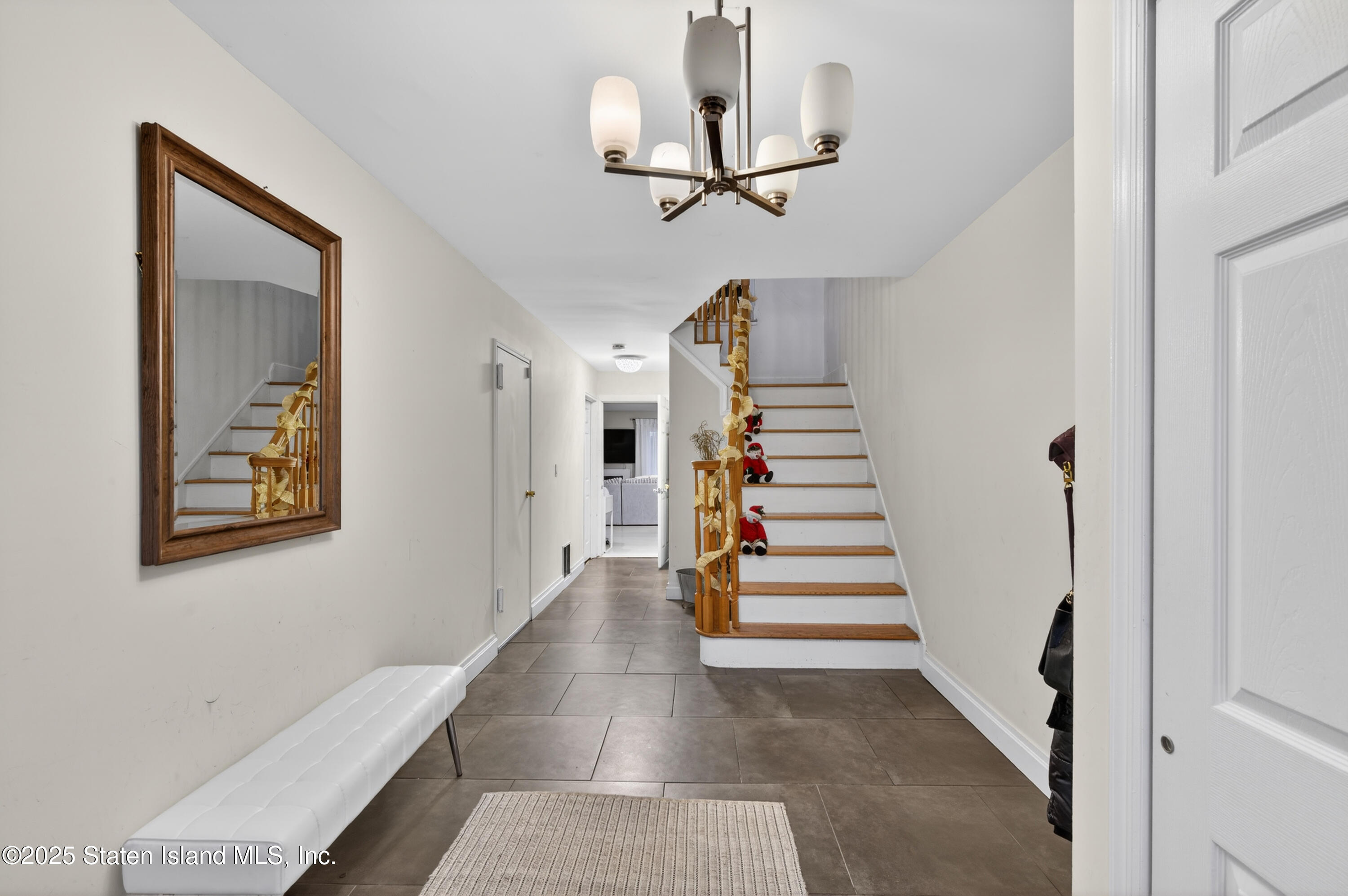 70 Annadale Road Staten Island, NY 10312 - Photo 3 of 35 a view of entryway and hall with wooden floor