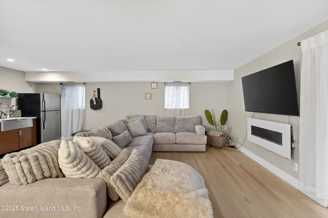 a living room with furniture and a couch