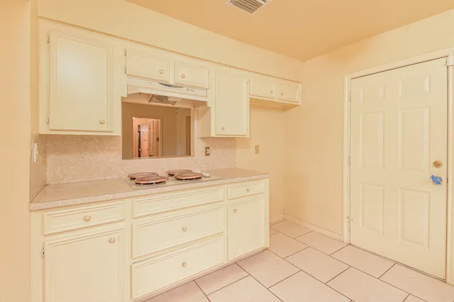 a view of a backyard with a cabin