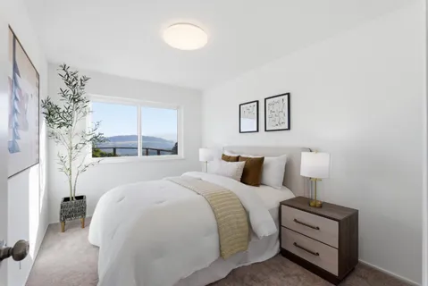 a kitchen with a sink stove and refrigerator