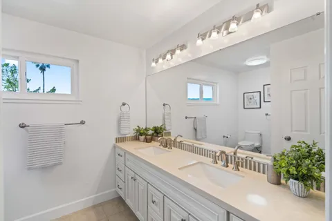 a view of a backyard with pathway