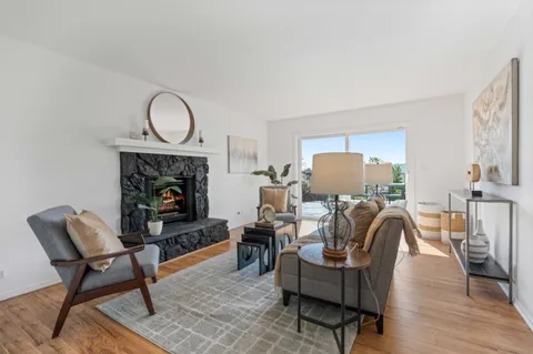 a view of front door of house with yard