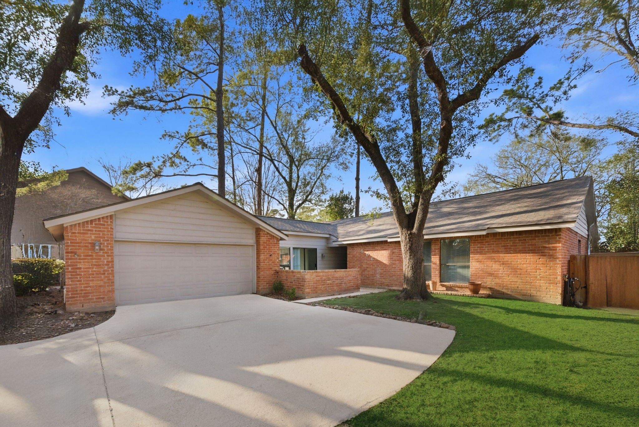 506 Willow Wisp Circle Spring, TX 77388 - Photo 1 of 38 front view of a house with a garden