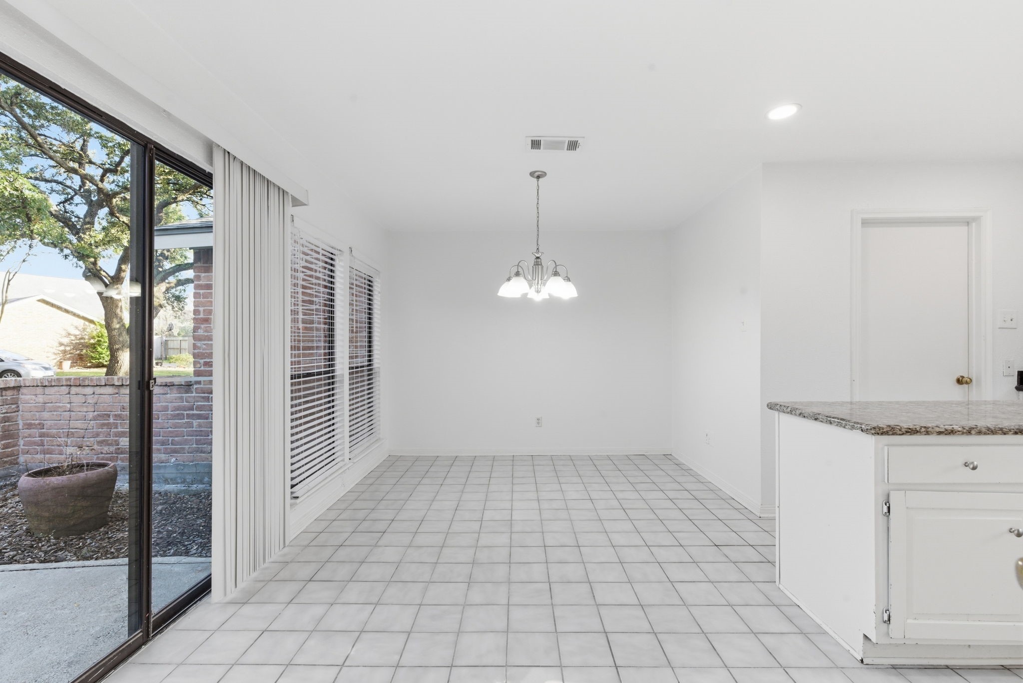 506 Willow Wisp Circle Spring, TX 77388 - Photo 12 of 38 wooden floor in an empty room with a window