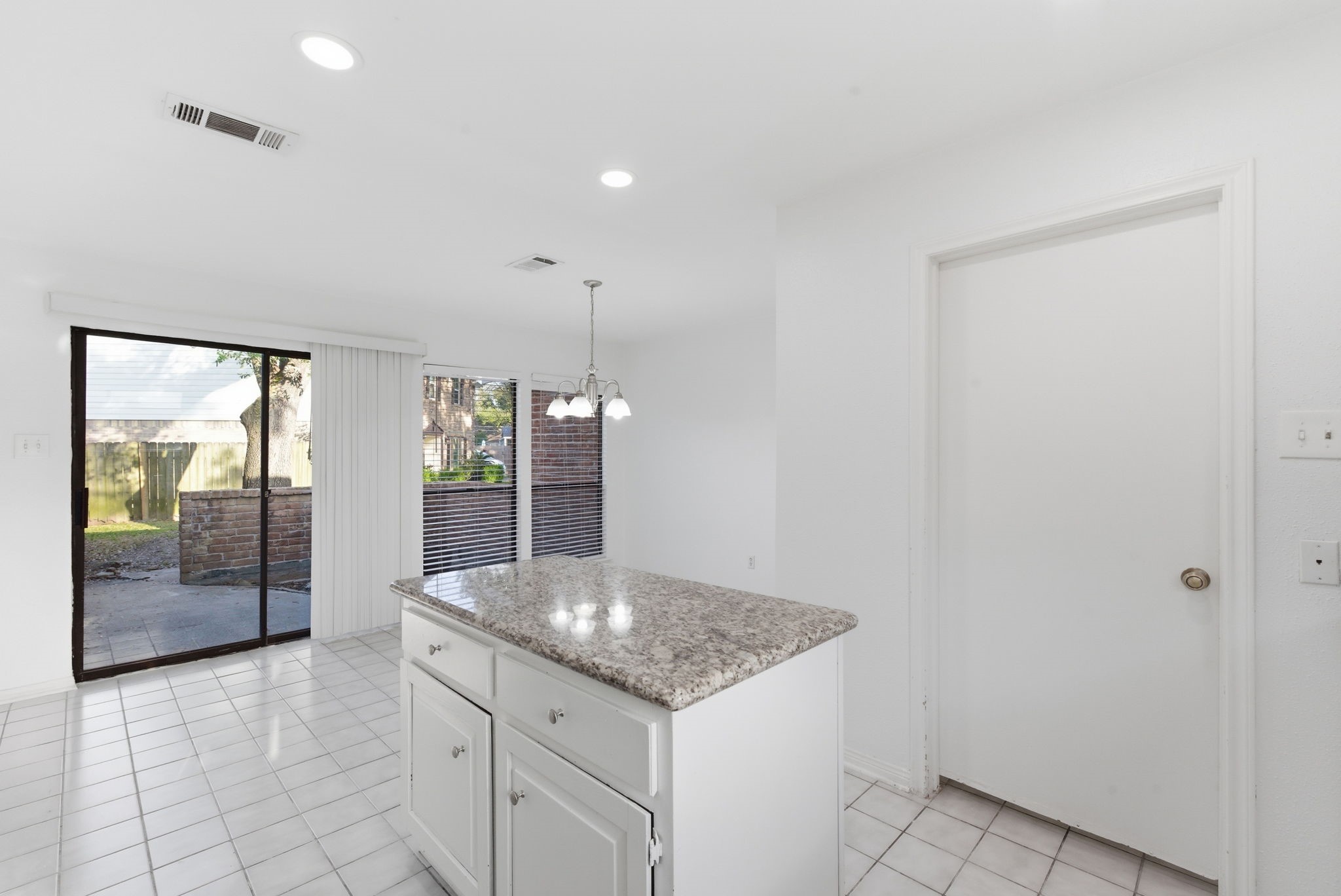 506 Willow Wisp Circle Spring, TX 77388 - Photo 17 of 38 a kitchen with granite countertop a sink and a stove