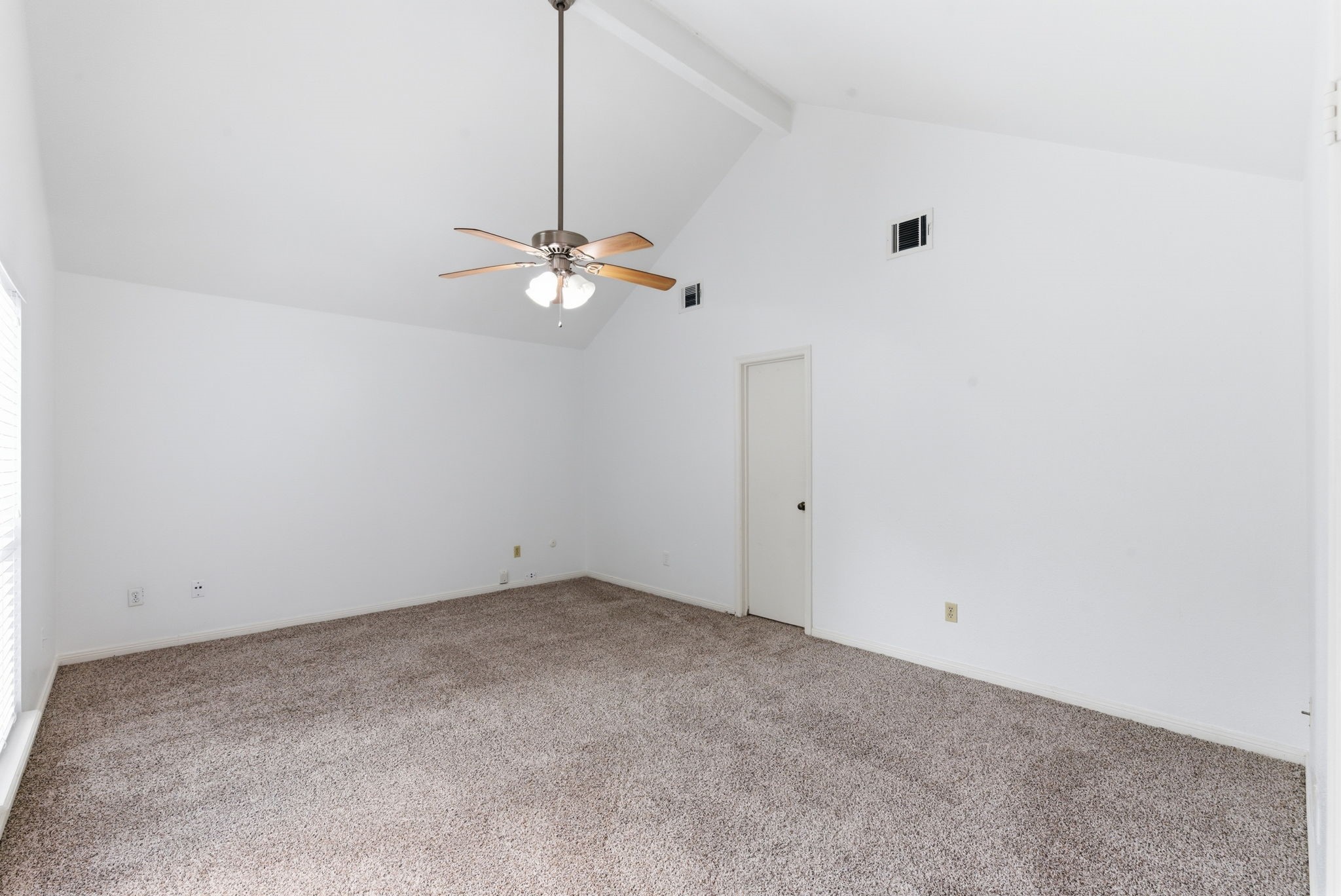 506 Willow Wisp Circle Spring, TX 77388 - Photo 22 of 38 a view of an empty room with a chandelier fan
