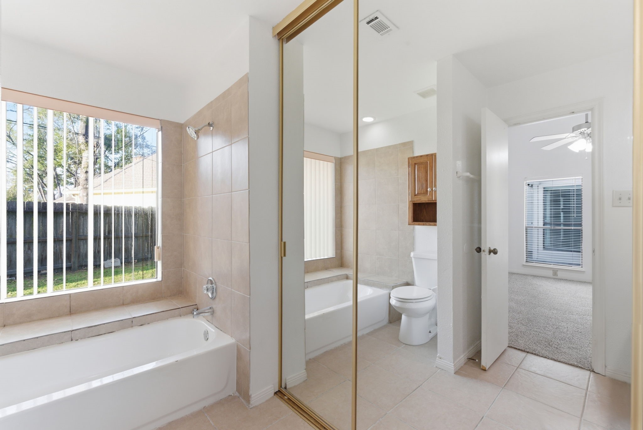 506 Willow Wisp Circle Spring, TX 77388 - Photo 25 of 38 a bathroom with a tub and shower