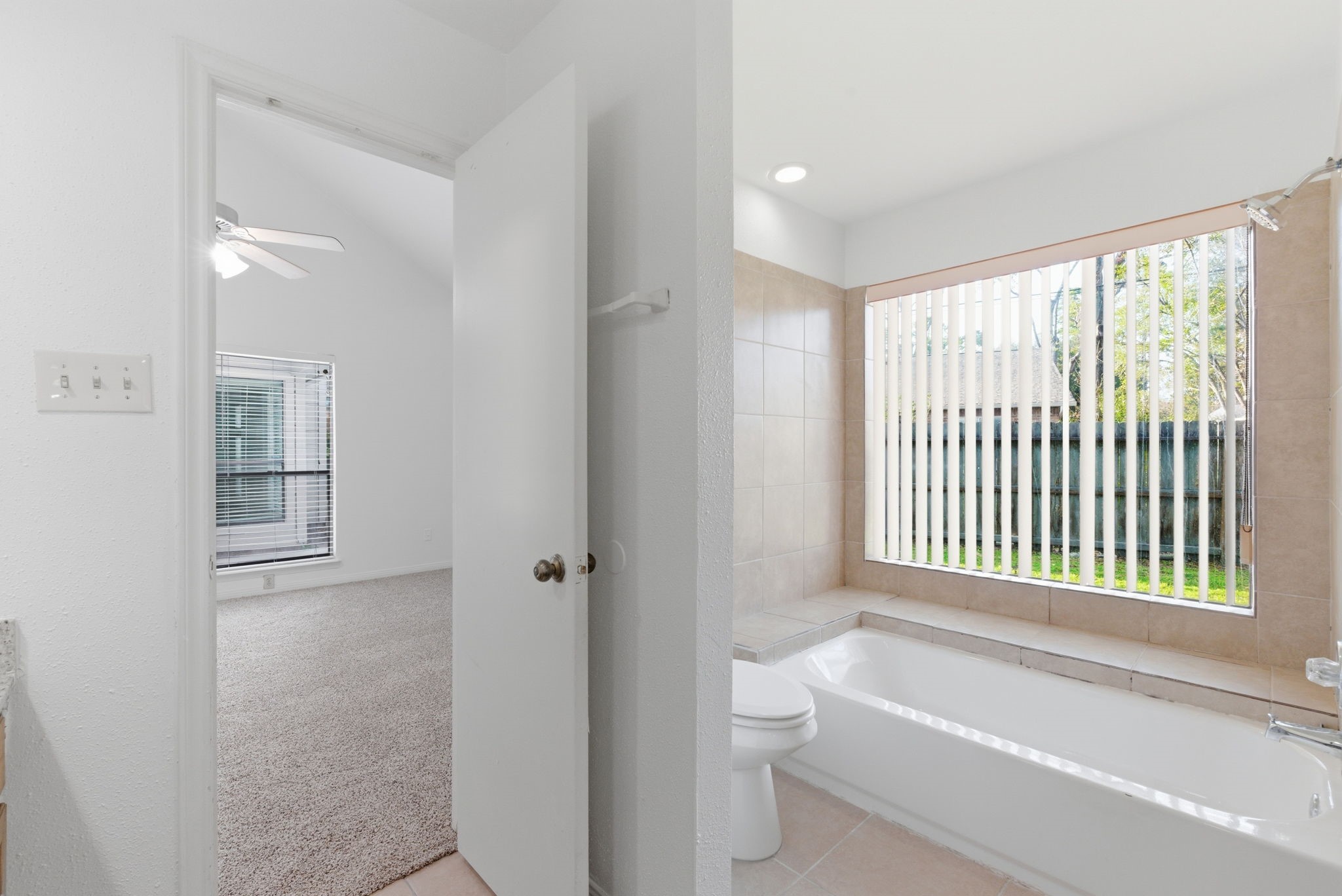506 Willow Wisp Circle Spring, TX 77388 - Photo 26 of 38 a bathroom with a bathtub and a shower