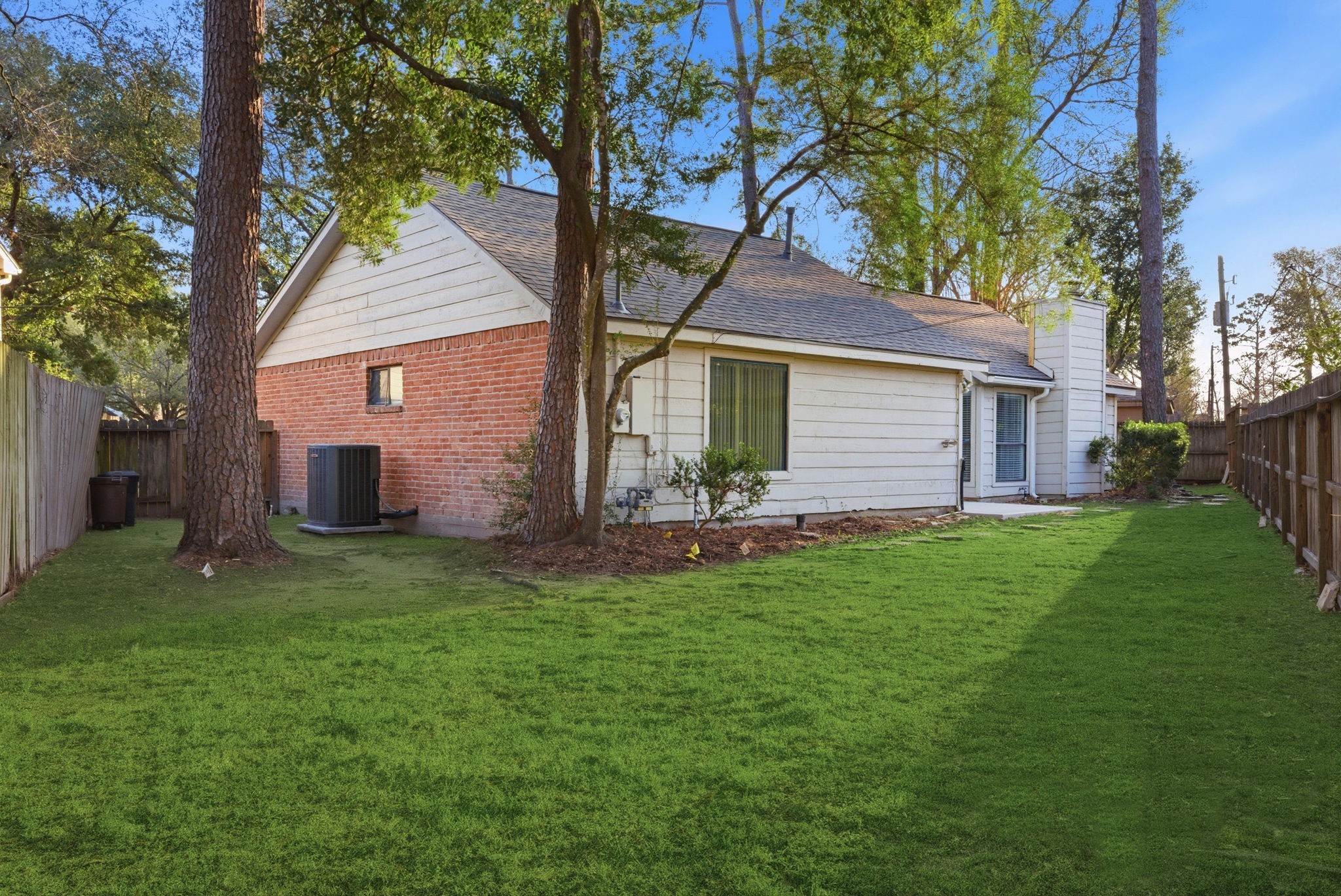 506 Willow Wisp Circle Spring, TX 77388 - Photo 32 of 38 a view of a backyard with a large tree