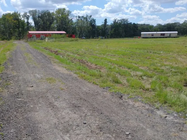 a view of a outdoor space with a swimming pool