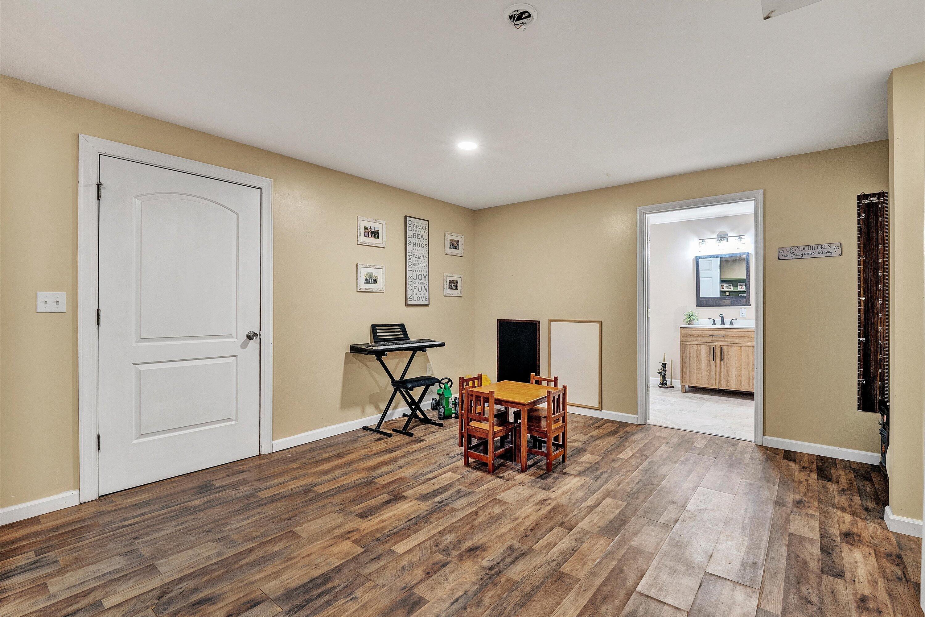 180 Thompson Ridge Circle Ferrum, VA 24088 - Photo 47 of 74 a view of a livingroom with furniture and wooden floor