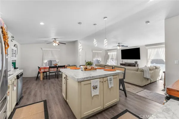 a room with furniture and a flat screen tv
