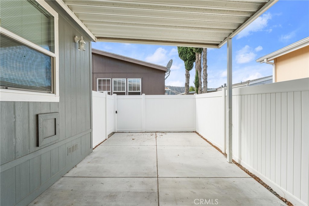 4901 Green River Road, Unit 96 Corona, CA 92878 - Photo 27 of 35 a view of a house with a garage