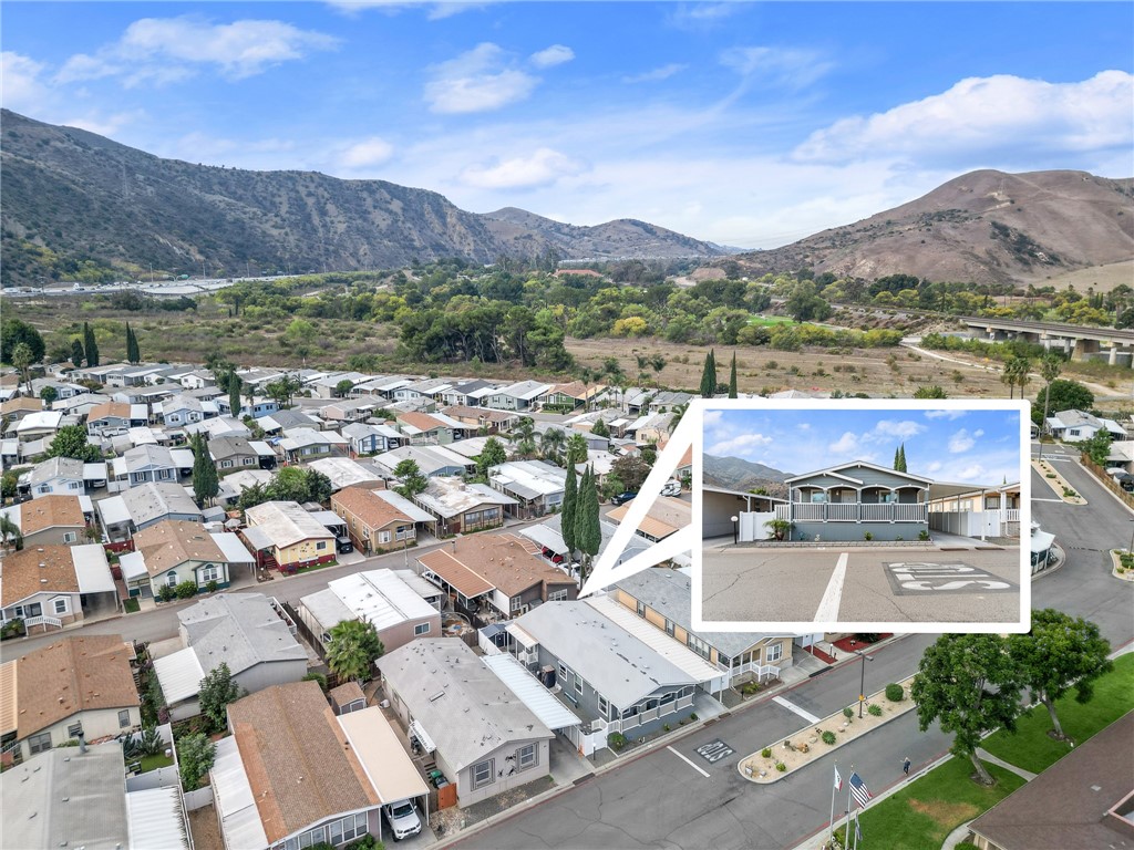 4901 Green River Road, Unit 96 Corona, CA 92878 - Photo 33 of 35 an aerial view of residential house with outdoor space and mountain view