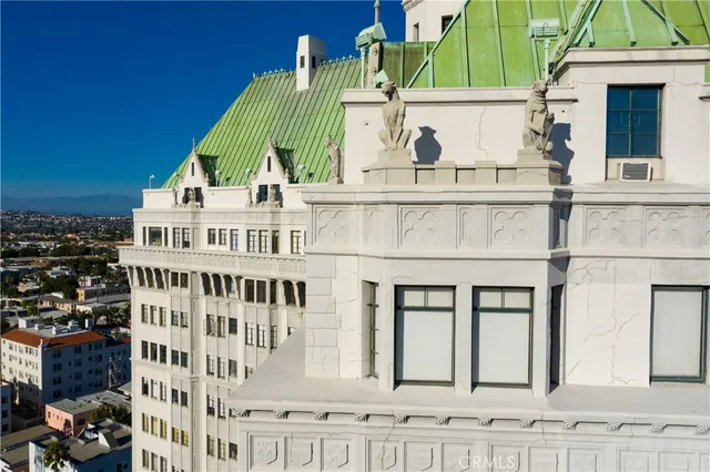 a view of a building with a street