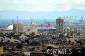 a view of water with tall building